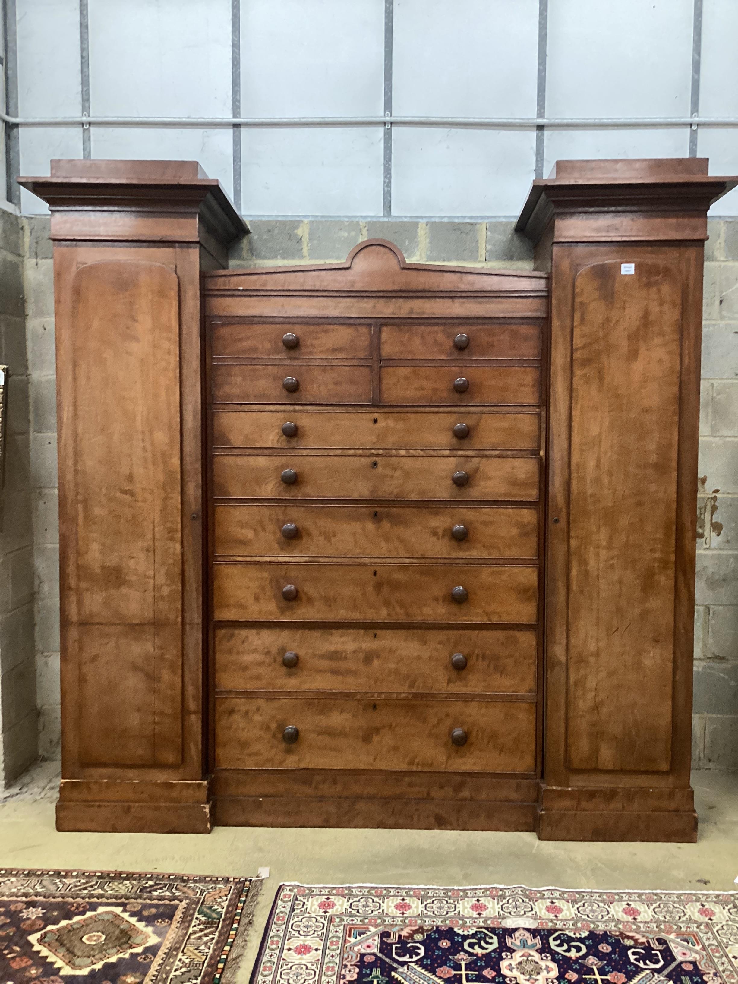 A Victorian mahogany Beaconsfield wardrobe, width 230cm, depth 66cm, height 226cm